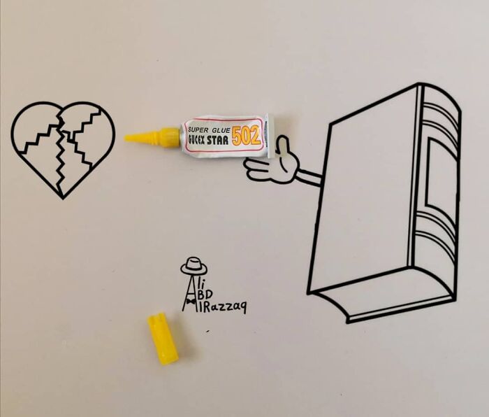 Illustration using everyday items showing a book hand holding super glue to fix a broken heart drawing.