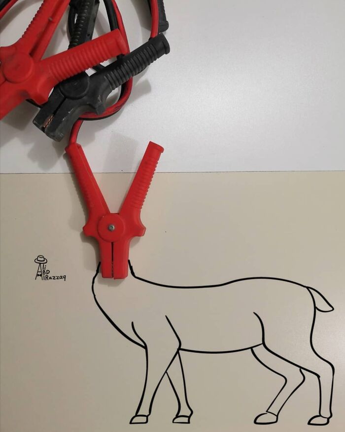 Clamps creatively used as the head of an interactive illustration of a deer, incorporating everyday items in art.