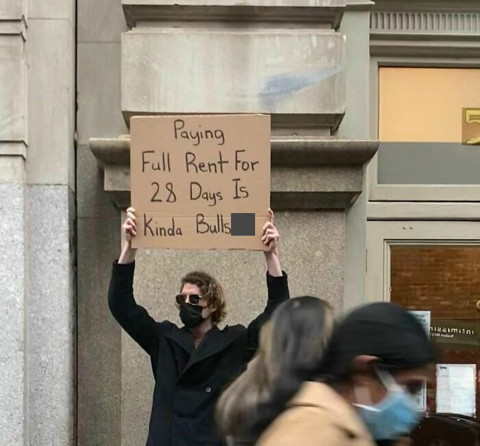 Dude-Holding-Signs-Protesting