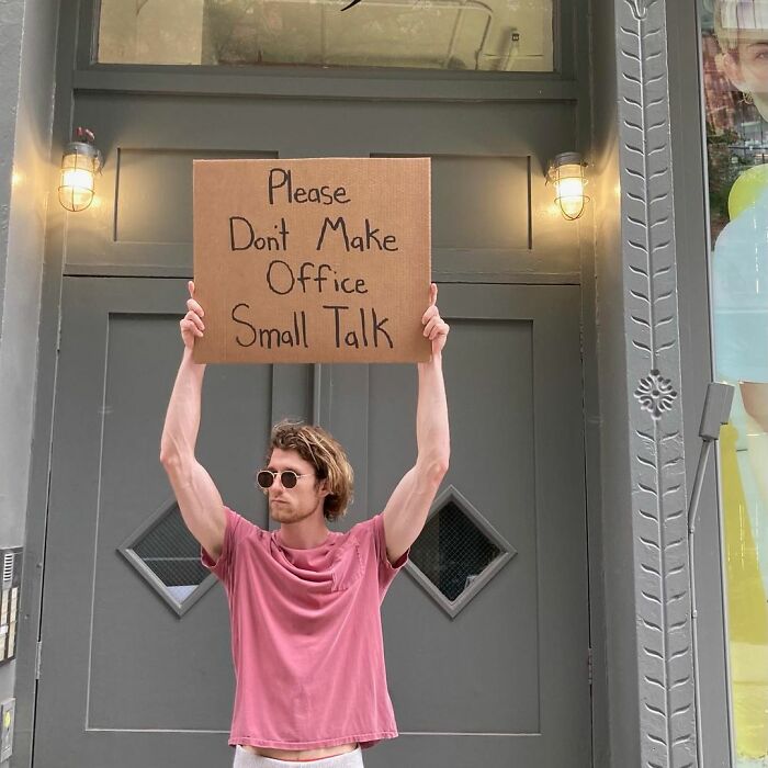 Dude-Holding-Signs-Protesting