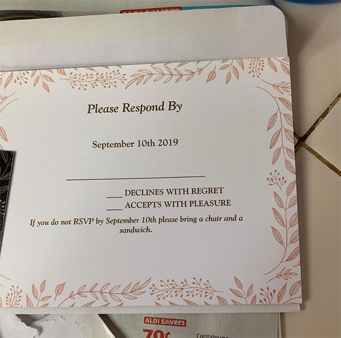 A Wedding Invitation, A Chair And A Sandwich