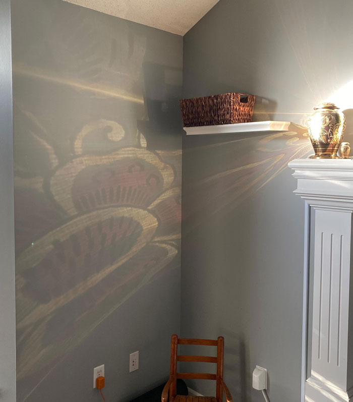 Every Morning The Sun Hits My Mom's Urn And Reflects On The Wall In This Pretty Design