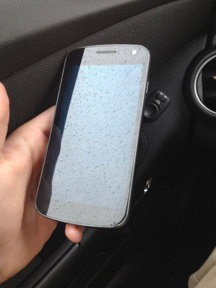 Reflection From My Car Window Onto My Phone Looks Like The Stock Apple Wallpaper