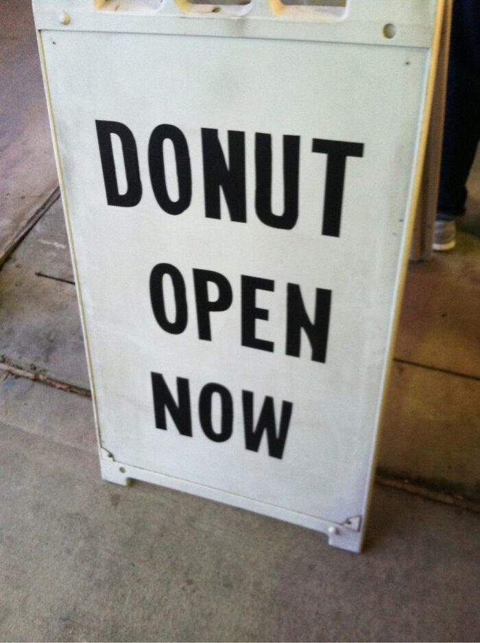 Was Along The Line At The Dmv In A Retail Strip. Bad Grammar, But Great Advertising!