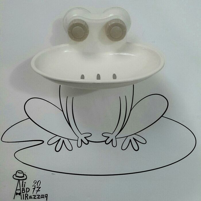 Interactive illustration of a frog using everyday items like a soap dish and faucet handles as eyes and mouth.
