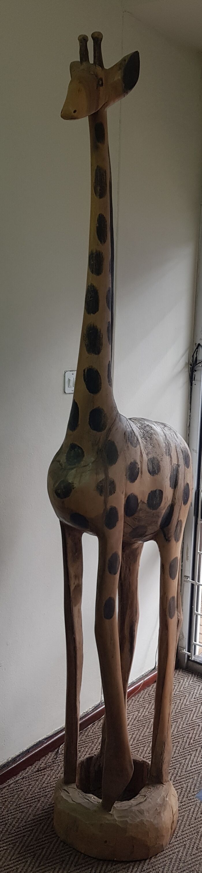 A 2,4 Meter ( 7,8 Feet) Carved Giraffe.