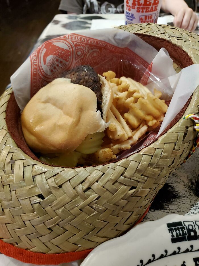 The Kid's Meal At The Big Texan Served In A Hat. The 7 Year Old Recipient States, "Yeah, This Is Kinda Weird, Dad...."