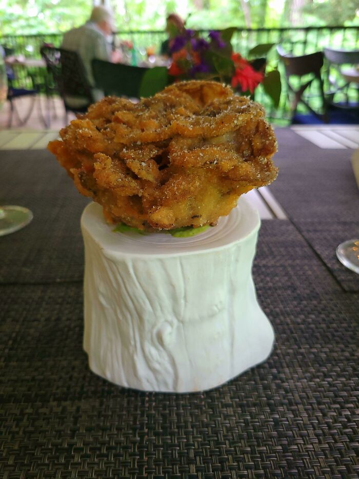Deep Fried Mushroom On A Ceramic Log