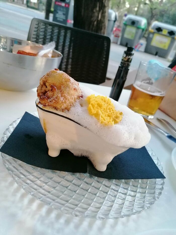 It's Called El Ultimo Baño (The Last Bath). Roasted Whole Quail In Foamy Broth And A Piece Of Spongy Bread. It Was Pretty Meh-Tasting. Once Won The City's Weekly Tapas Award. (Bar Is Called Depikofino)