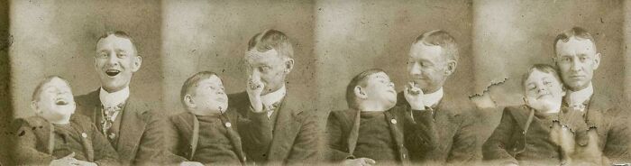 Sassy Little Boy Tweaking Fathers Nose. C1910