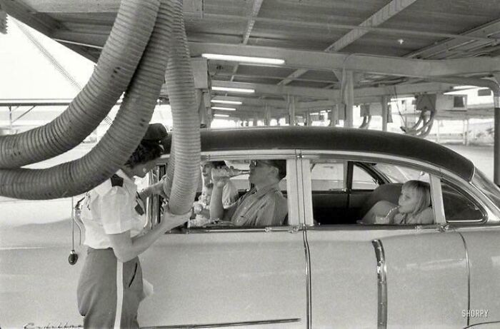 Getting Cooled Air Piped Into The Car While Enjoying A Meal At A Drive-In Restaurant. Houston, Texas, 1957