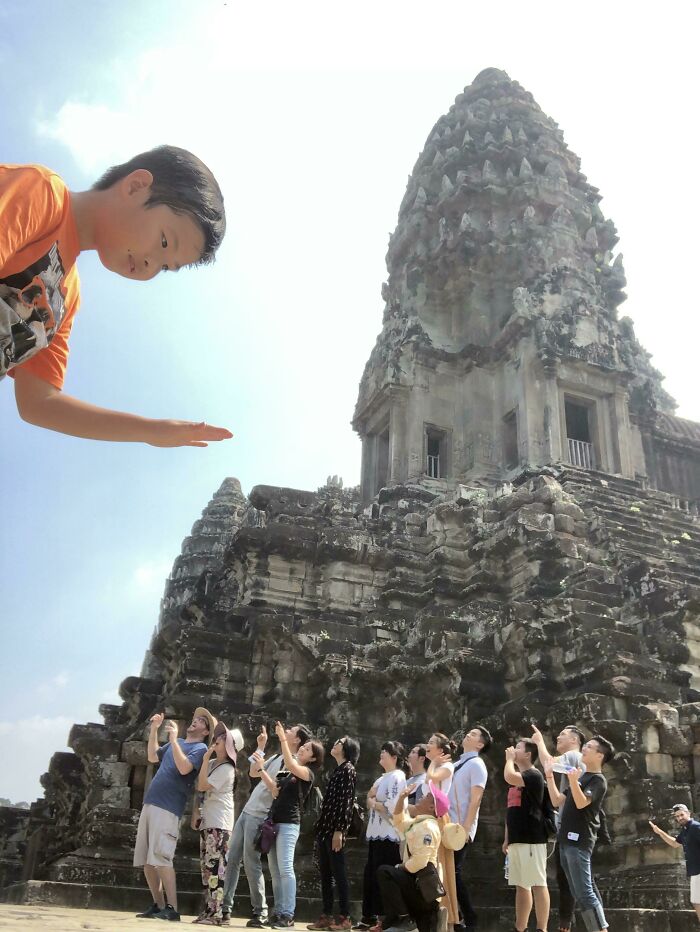 Our Tour Guide Took This Photo Of Our Group At Angkor Wat Earlier Today, Thought It Belonged Here