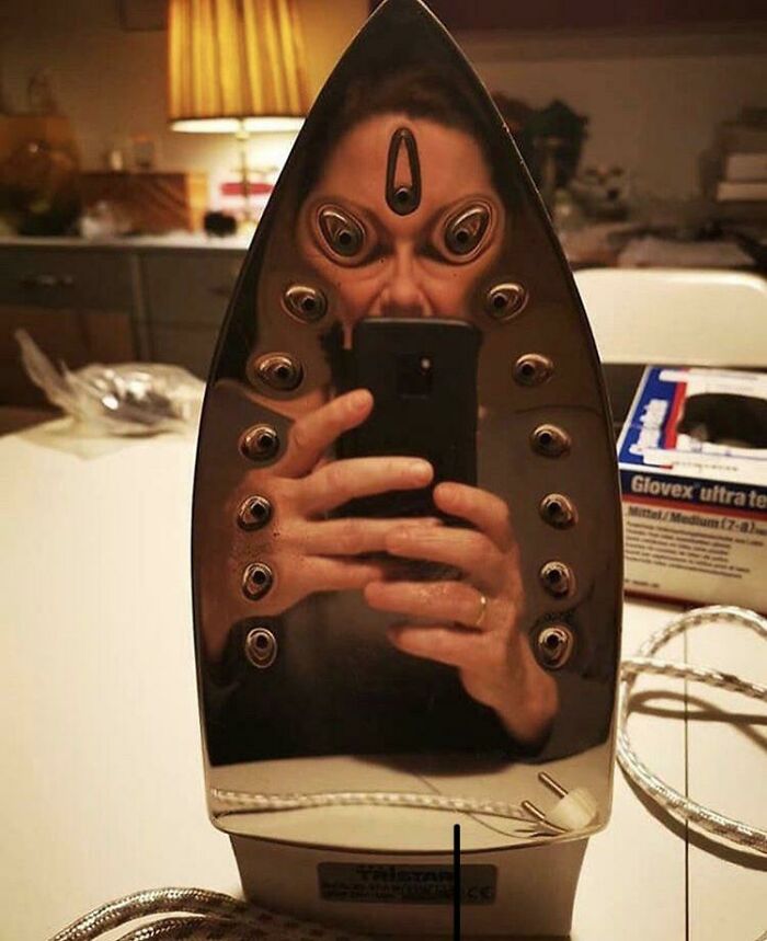 Reflection In Steam Iron