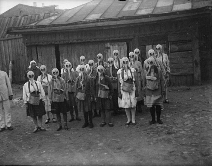 Group Of Girls Wear Their Gas-Masks During A Gas Drill. Moscow , 1930s