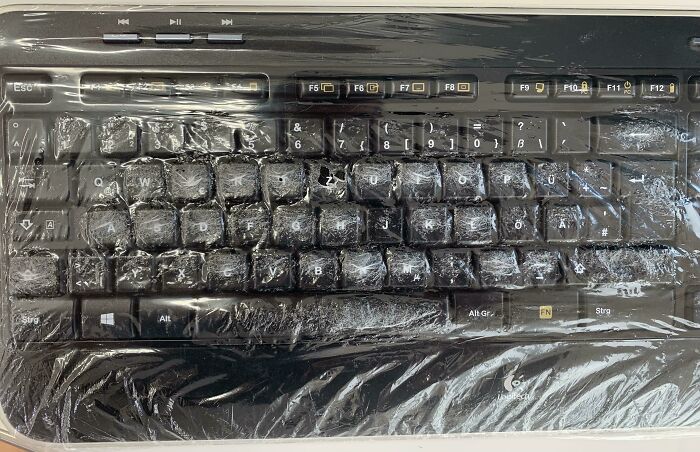 Plastic Keyboard Cover At Work. I Work At A Dentist's Practice In Germany. Tooth = Zahn, Hence The Z