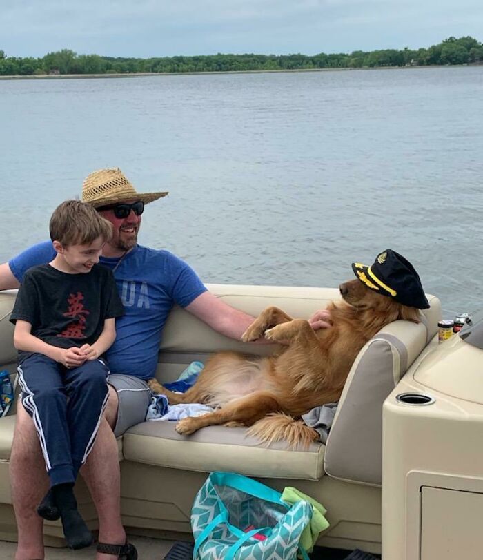 This Little Lady Wasn't Even Ours.. She Jumped Into Our Boat From Another. She Got Trevor To Rub Her Belly And Me To Give Up My Captain's Hat In Under A Minute. Who Doesn't Love Dogs?!?