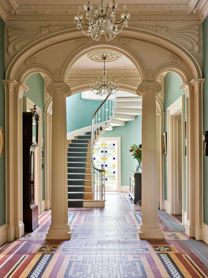 Entrance Hall Divided With Triple-Arched Columned Screen In Taitlands, A Recently Restored 19th-Century Greek Revival Country House Located In Stainforth, North Yorkshire, England