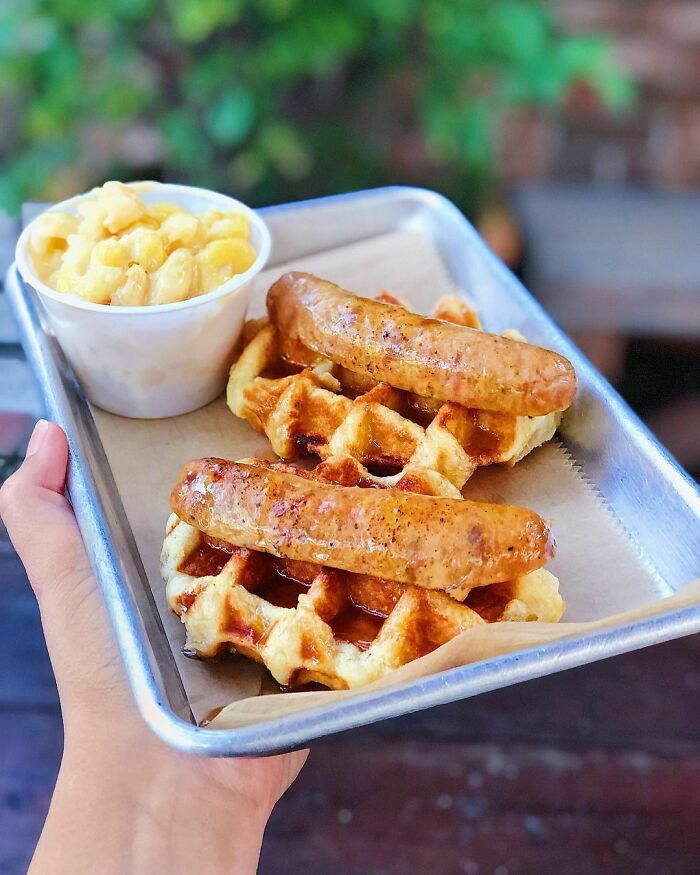 Spicy Chicken Andouille Sausage On Top Of A Pearl Sugar Belgian Waffle, Drizzled With Maple Syrup. My Mouth Just Watered Typing That