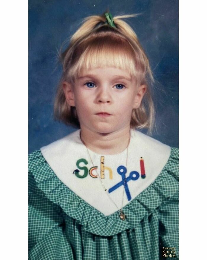 My Daughter's Preschool Photo. Not Sure If She Was Sick Of Pre-K Or Just Hating The Dress? But You Gotta Love The Matching Crayon Hair Tie