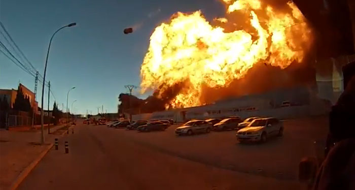 Burning Warehouse Explodes, Sending A Propane Tank Flying Through The Air