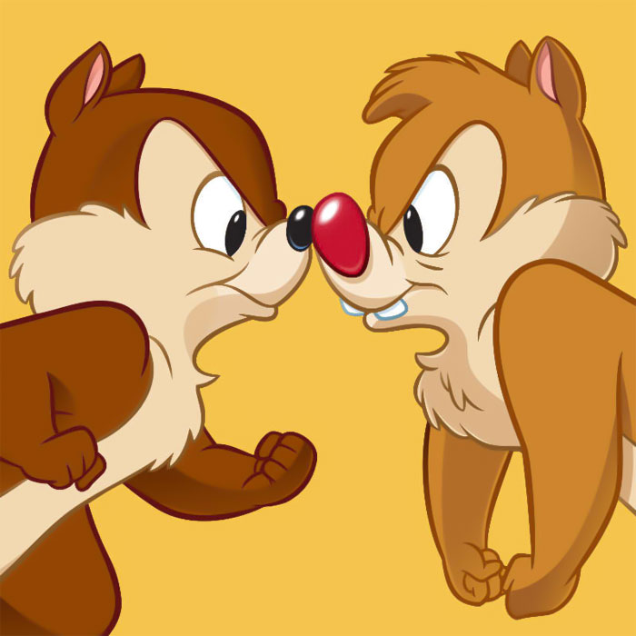 Chip and Dale looking angrily at each other 