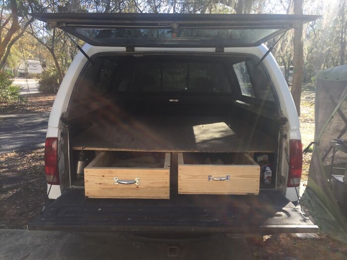 Platform In The Back Of My Truck With 6’ Drawers On Rollers. Mostly Repurposed Materials!