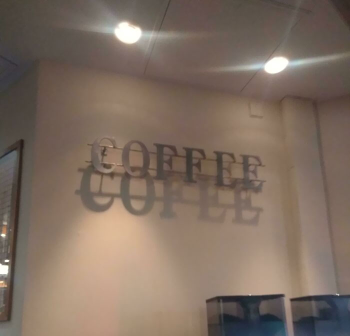Sign Says Coffee, Shadow Says Cofee