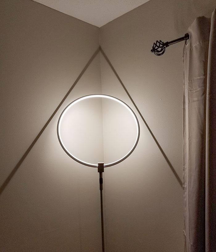My Round Lamp Throws A Triangle Shadow