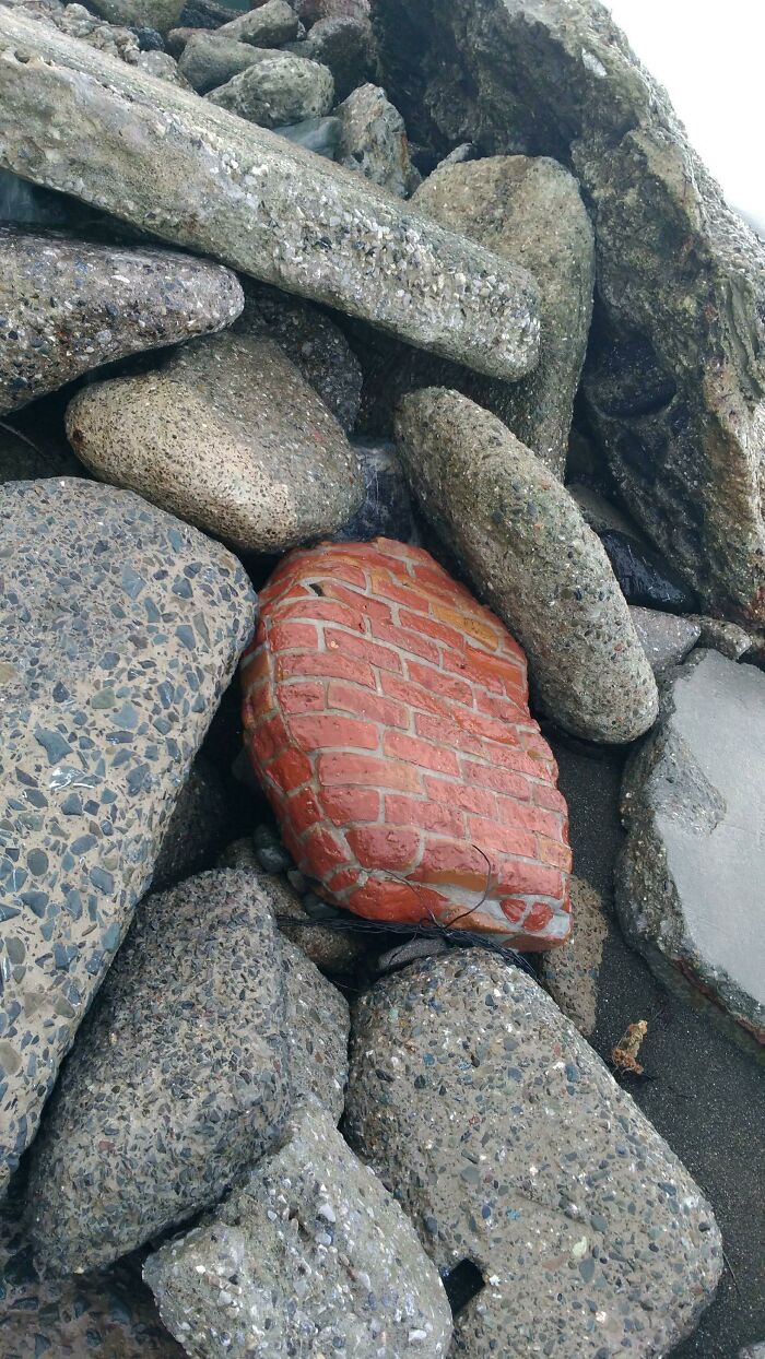 This Brick Wall Got Smoothed Into A Rock