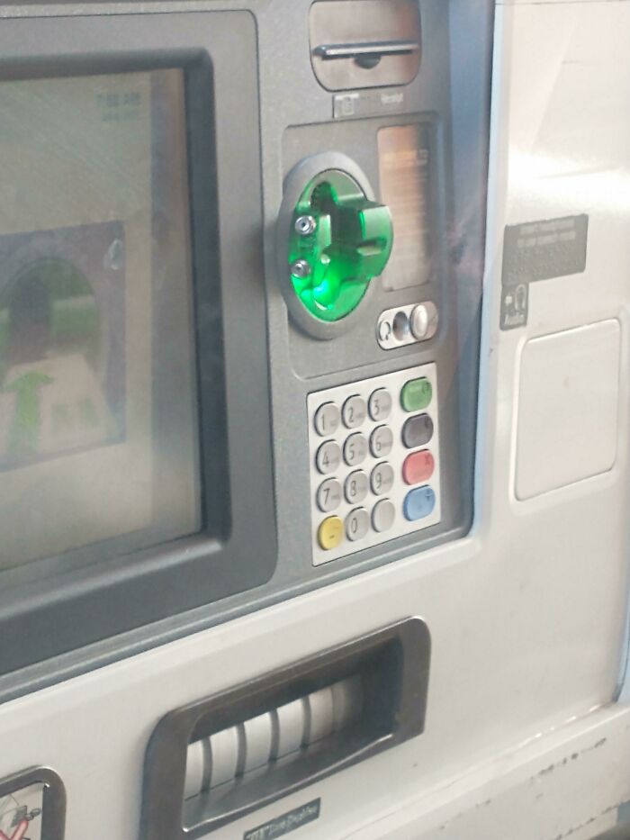 What Are These 2 Metal Studs On The Side Of This ATM?