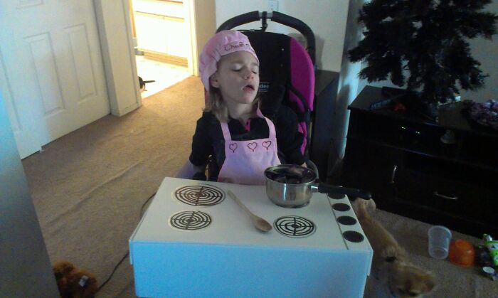 My Daughter Is In A Wheelchair, So We Turned Her Into A Chef At The Stove For Halloween