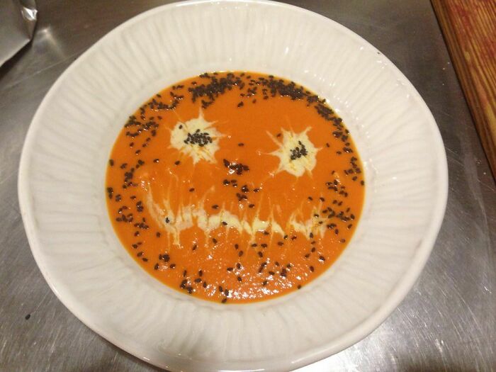 I Was The Soup Guy At A High-End Restaurant, On Halloween The Chef Let Me Send All Of Them Out Like This (Carrot Ginger Soup, Cardamon Cream, Black Sesame Seeds)