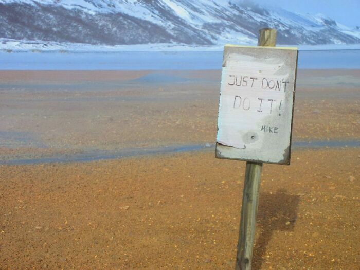 This Sign Reminding Tourists Not To Walk On A Geothermally Active Area In Iceland