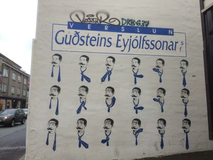 A Guide To Tying A Tie, Painted On A Wall In The Shopping Street Of Reykjavik, Iceland