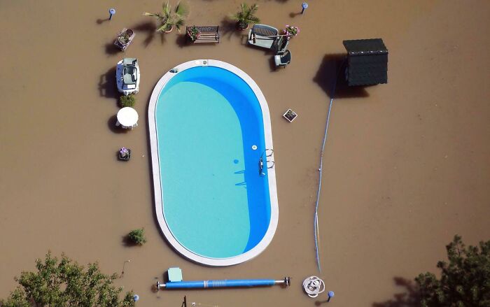 Swimming Pool Untouched By Dirty Flood Water