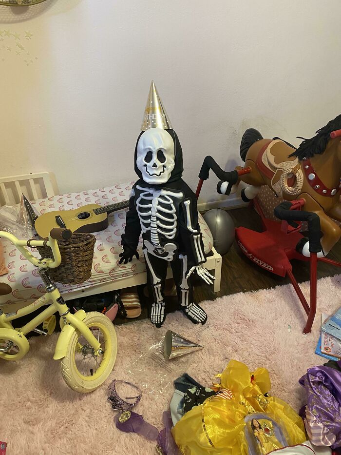 My Daughter Is Obsessed With Halloween. We Bought Her A Skeleton Costume For Her Birthday And She Insisted On Putting It On Immediately, With A Birthday Hat