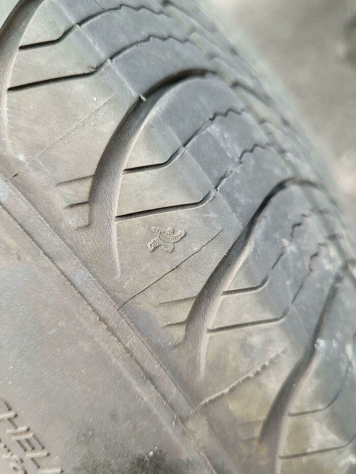This Tiny Michelin Man I Found In The Tread Of My Tire While I Was Doing My Brakes Today