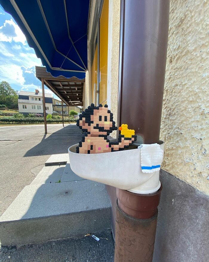 Artist 'Vandalizes' The Streets With His Fun And Unique Pixel Art (30 Pics)