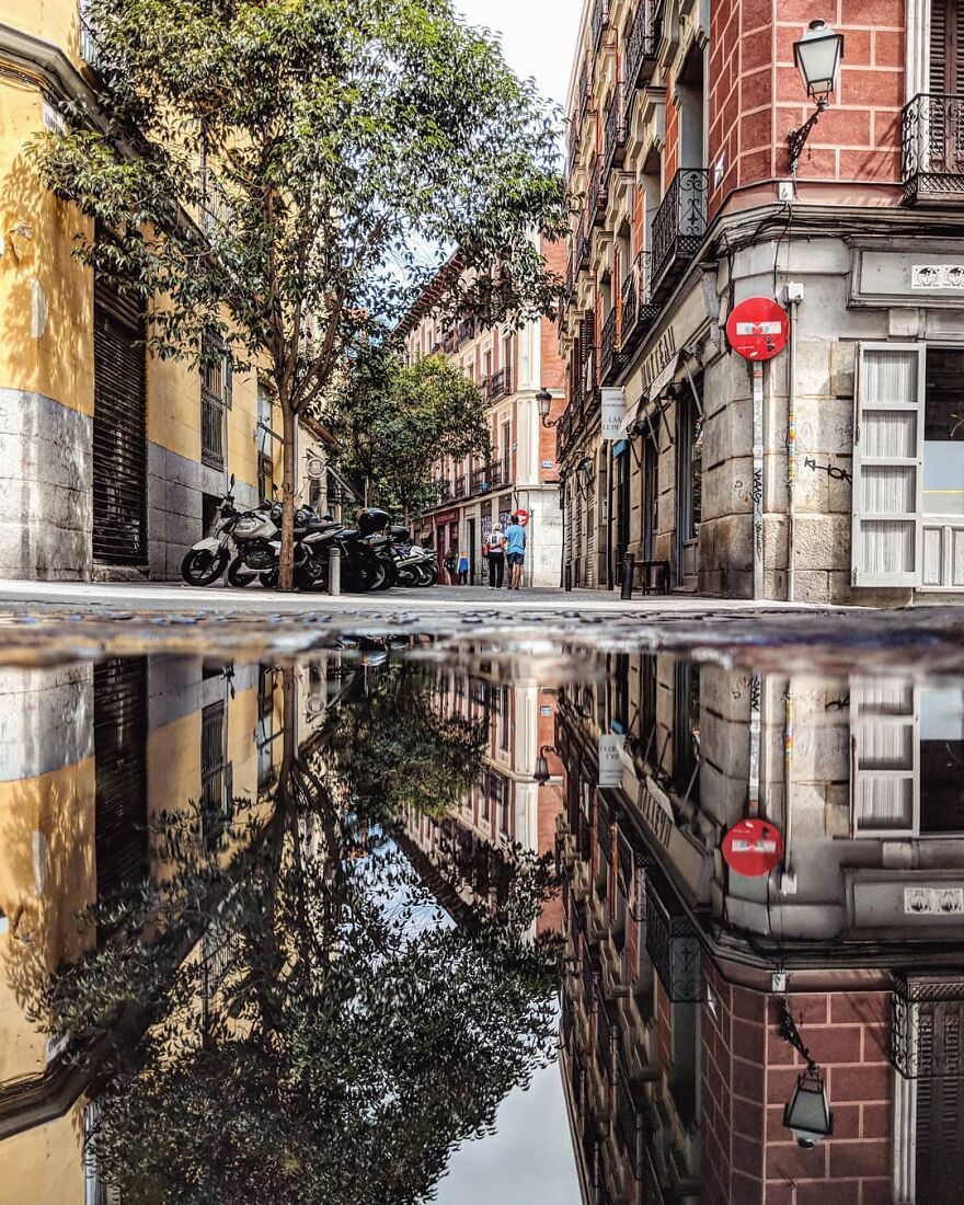 Unusual Pictures Of The Beauty Of Madrid Through Reflections And Puddles