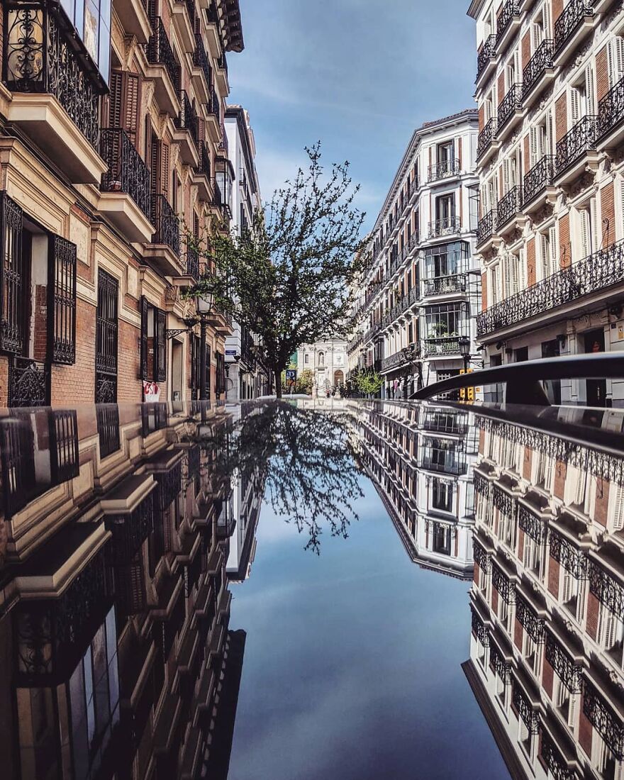 Unusual Pictures Of The Beauty Of Madrid Through Reflections And Puddles