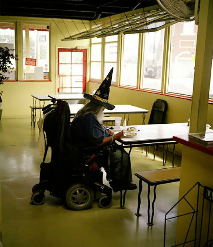 Wizard In A Wheelchair Enjoying Breakfast