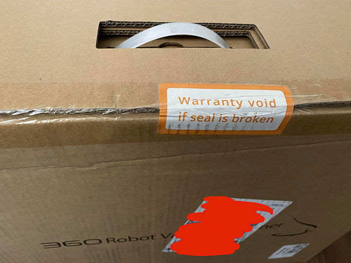 Warranty Void Sticker On The Outside Of The Box