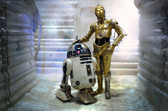R2D2 and C-3PO standing next to each other