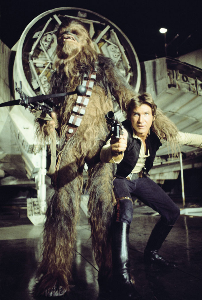 Han Solo and Chewbacca standing next to each other 