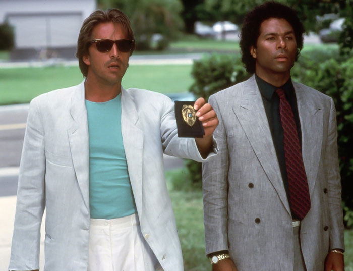 Crockett and Tubbs standing next to each other