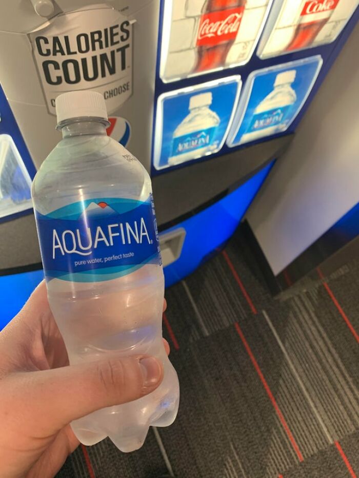 In A Moment Of Weakness, I Ordered A Coke From The Vending Machine. It Dispensed A Water Instead. It Is A Sign