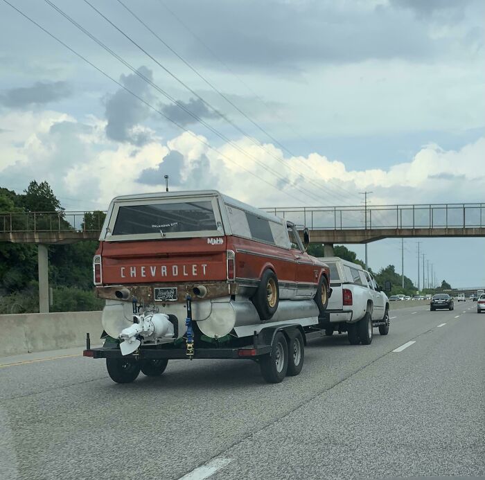 Saw This On A Highway In Missouri. I Think It’s An Old Truck Turned Into A Boat…?