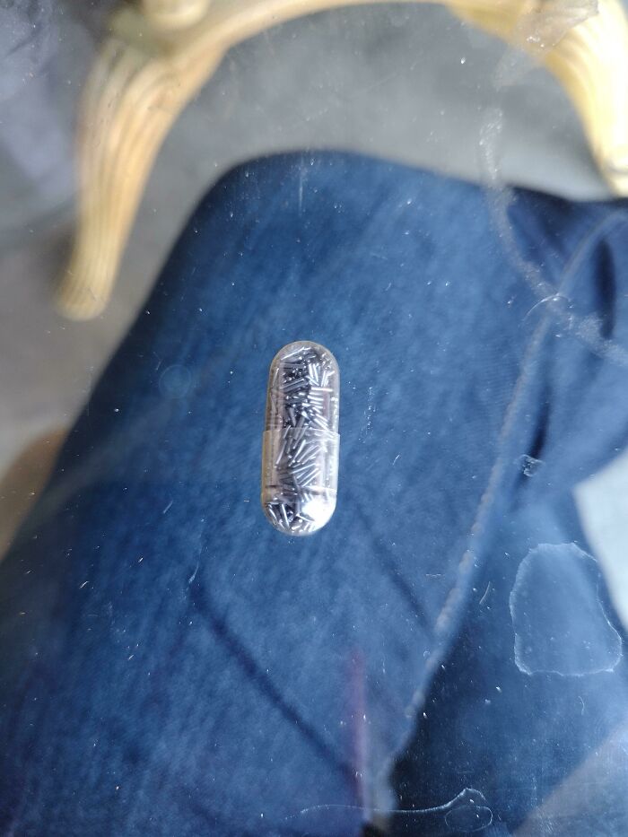 Found Four Of These Capsules Filled With What Appears To Be Metal Shavings?