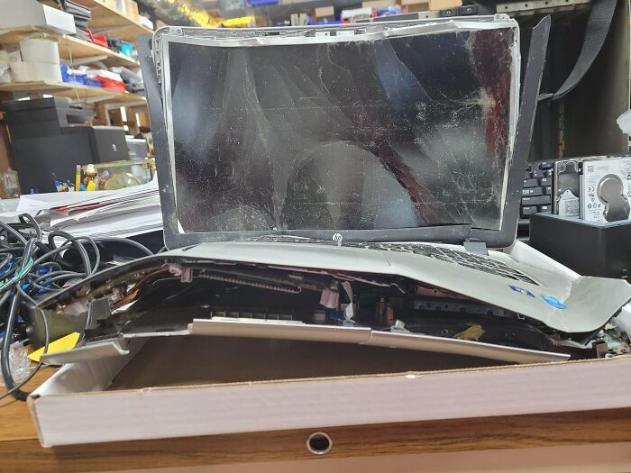 The Aftermath Of A High Speed Rear End Collision With The Laptop In The Trunk
