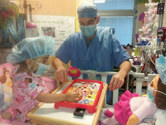 My 2-Year-Old Niece Who Has Been Hospitalized Was Playing Operation With Her Doctor And Dora The Explorer. All Scrubbed Up And Ready For Surgery